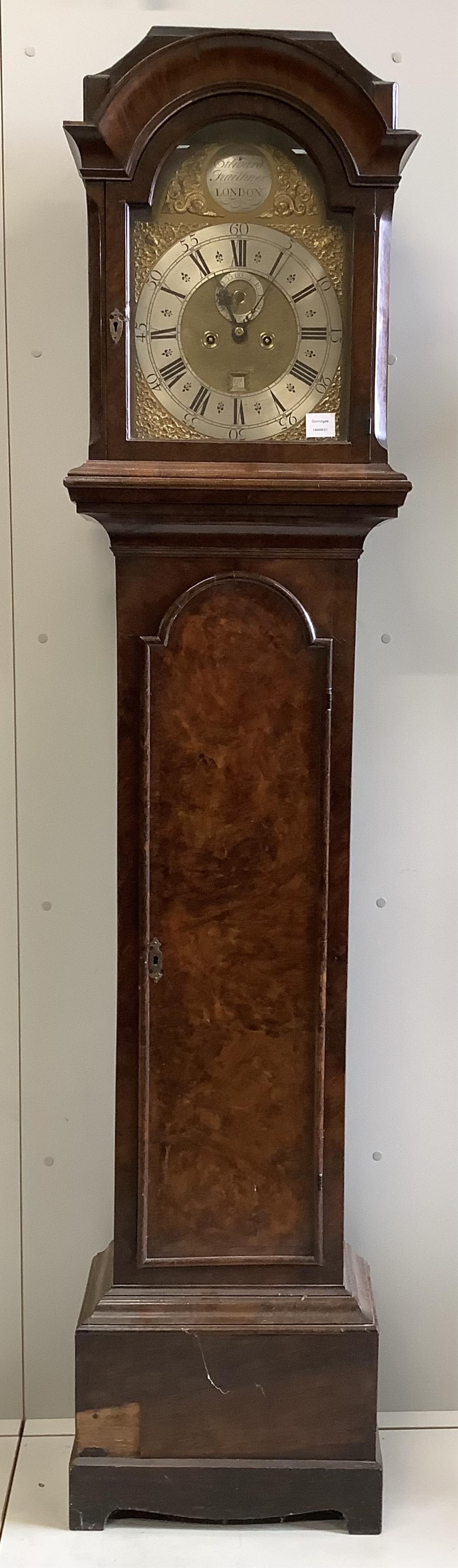 Edward Faulkner, London, a George III burr walnut cased eight day longcase clock, with an arched brass and silvered dial, height 213cm, Plinth reduced. Condition - poor